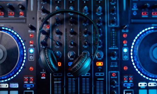 top-view-on-audio-studio-sound-mixer-panel-with-he-2022-11-09-05-22-46-utc
